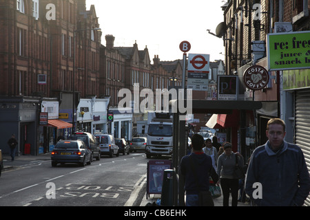 Willesden Green shops and bus stop outside the Underground Station Stock Photo