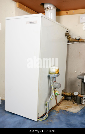 Newly installed oil burning boiler in a domestic central heating system Stock Photo