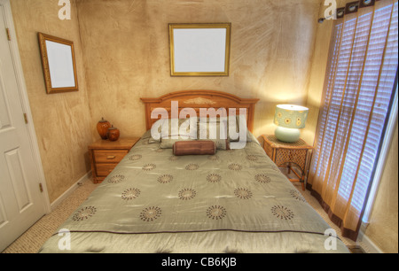 Nicely furnished bedroom interior. Stock Photo