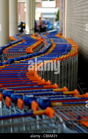 Rows of shopping trolleys outside Sainsbury's supermarket, Londonderry, Northern Ireland. Stock Photo