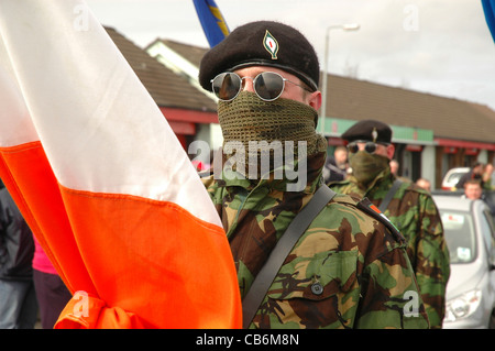 Masked members of the Real IRA at a republican commemoration in Londonderry, Northern Ireland. Stock Photo