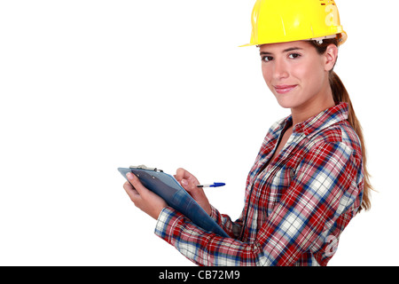 craftswoman taking notes Stock Photo