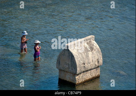 Lycian tomb in the sea Teimioussa, Ucagiz, Kalekoy Simena Turkey. Stock Photo