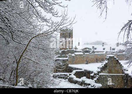 The ruined Mount Grace Priory in North Yorkshire, England, looks especially lovely under a coating of fresh snow. Stock Photo