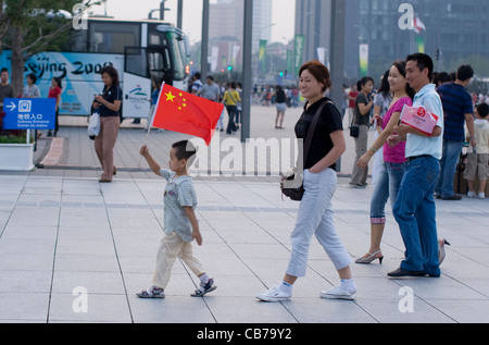 Beijing, China September 13, 2008: Paralympic Games shows Chinese families playing in the fountains near the Water Cube Stock Photo