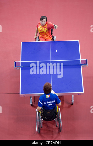 September 14, 2008: Day nine at 2008 Beijing Paralympic Games Qian Li (red) of China beating Italy's M. Brunelli table tennis Stock Photo