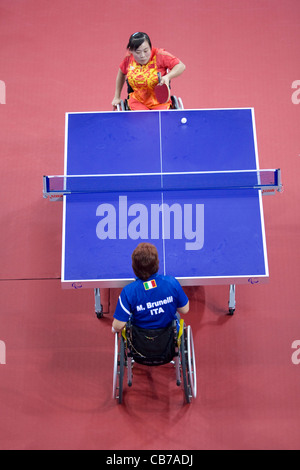 September 14, 2008: Day nine at 2008 Beijing Paralympic Games Qian Li (red) of China beating Italy's M. Brunelli table tennis Stock Photo
