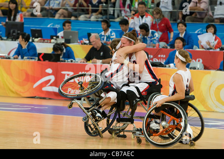 Beijing, China September 14, 2008: Day nine Paralympic Games showing happy USA (light) women wheelchair defeat Germany Stock Photo