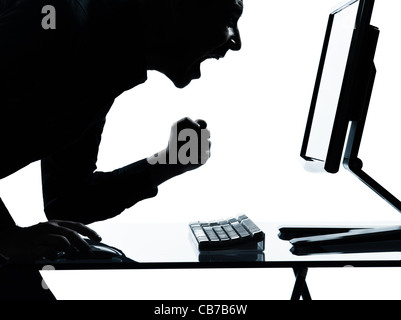 one  business man computer computing happy portrait silhouette in studio isolated on white background Stock Photo