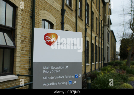 Company logos and signs at the GSK Glaxo factory in Ware, England Stock Photo