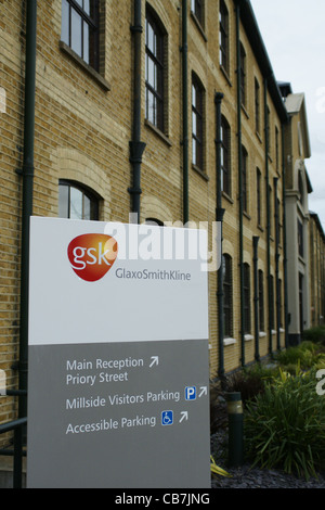 Company logos and signs at the GSK Glaxo factory in Ware, England Stock Photo