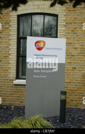 Company logos and signs at the GSK Glaxo factory in Ware, England Stock Photo