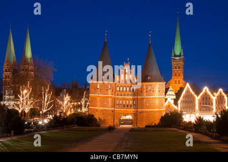 The Holsten Gate / Holstein Tor / Holstentor at Christmas in the Hanseatic City of Lübeck, Germany Stock Photo