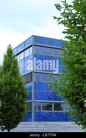 Solar power system on the outer facade of a office building. Stock Photo