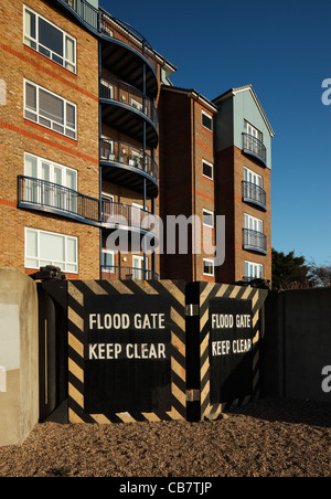 Thameside apartments protected with floodgates. Stock Photo