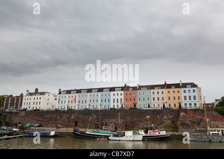 Pastel colour washed terrace overlooking the floating harbour in Bristol. Stock Photo