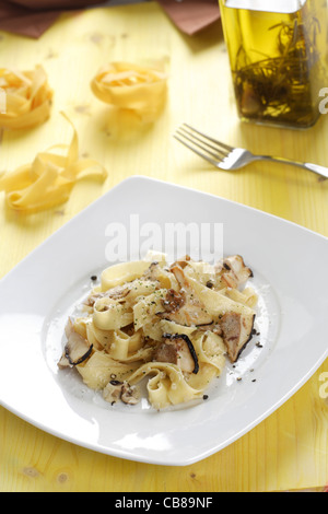 Pasta ribbons with mushrooms and parmesan Stock Photo - Alamy