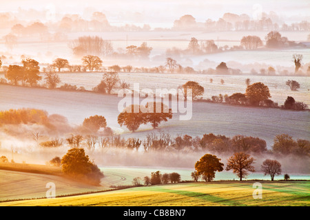 A winter sunrise view from Martinsell Hill over the Vale of Pewsey in Wiltshire, England, UK Stock Photo