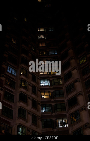 Lights on in apartment buildings at night Sha Tin New Territories Hong Kong China Stock Photo