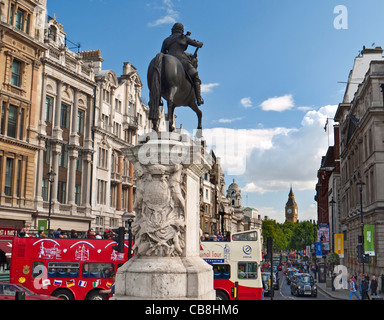 View from Trafalgar Square past statue of Charles I on horseback looking down Whitehall towards Big Ben, Westminster, London, UK Stock Photo