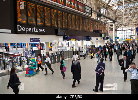 WATERLOO STATION Elevated view of the modern busy departures concourse with network information departures screens at Waterloo Station London SE1 Stock Photo