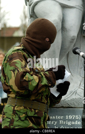 A member of the dissident Real IRA reads a statement at a 1916 Easter Rising commemoration in Londonderry, Northern Ireland. Stock Photo