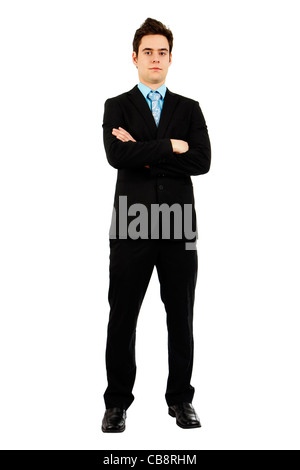Full body shot of an handsome confident serious young man in business suit with arms crossed. Stock Photo