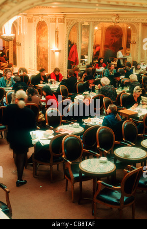 Paris, France, View Large Crowd People inside Angelina's French Restaurant Café, and Tea Room, tables, busy coffee shop interior, Inside Paris restaurants Stock Photo