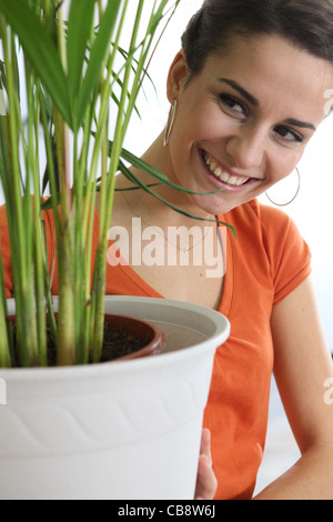 woman taking care of the plants Stock Photo