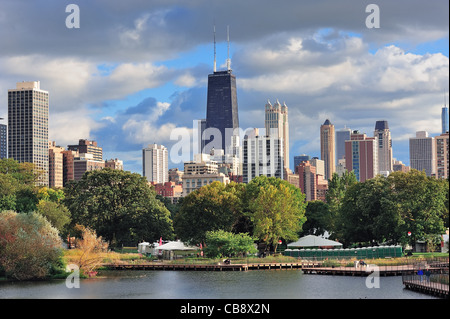 Chicago skyline with skyscrapers viewed from Lincoln Park over lake. Stock Photo