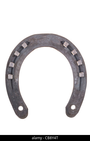 new horseshoe with nails isolated on white background Stock Photo