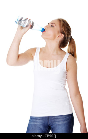 Thirsty. Cute teenager holding a bottle of water in the city smiling. Teen  girl, woman laughing happy about to drink water, posing touching hair city  Stock Photo - Alamy