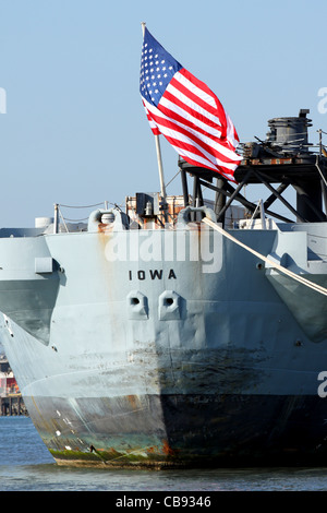 The flag of the United States flies on the fantail of the U.S. Navy battleship U.S.S. Iowa Stock Photo