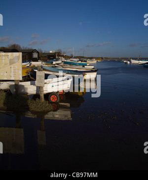 Boats moored at Orford Quay in Suffolk, England Stock Photo