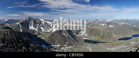 View to mountain Narodnaya (highest peak in Ural mountains) from peak of Karpinskiy. Polar Ural. National park Yugyd Va. Russia Stock Photo