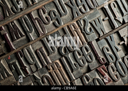 a tray of carved wooden letters, part of a letterpress set. Stock Photo