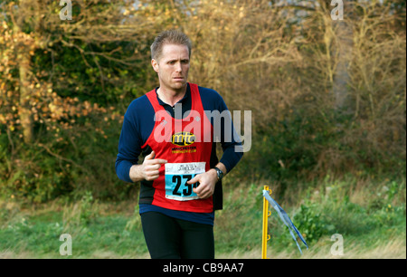 cross-country runner at wythenshawe park, manchester Stock Photo