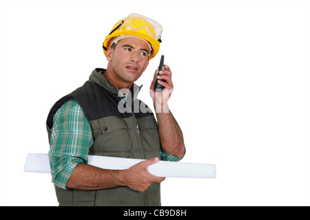 Foreman using radio receiver Stock Photo