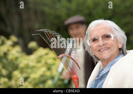 Older couple gardening Stock Photo