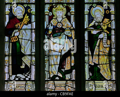 Stained glass window by the Kempe Studios depicting Saints Peter and John and Jesus, St Etheldreda's Church, West, Quantoxhead, Somerset, England Stock Photo