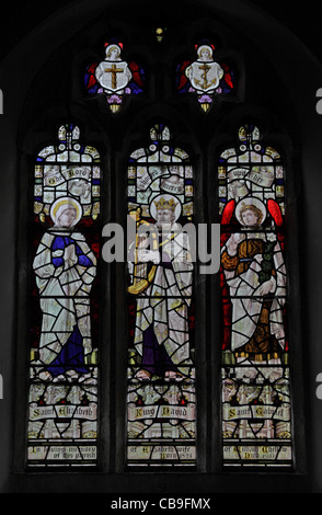A stained glass window by Robert J Newbery (1861 - 1940) depicting Saint Elizabeth, King David and Archangel Gabriel, St Feoca Church, Feock, Cornwall Stock Photo