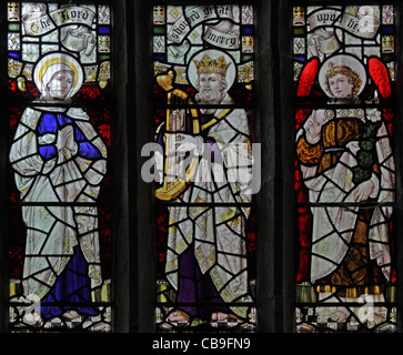 A stained glass window by Robert J Newbery (1861 - 1940) depicting Saint Elizabeth, King David and Archangel Gabriel, Church of St Feock, Feock, near Stock Photo