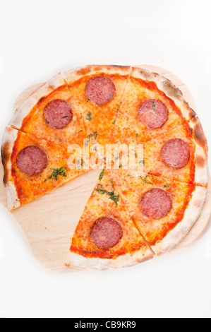 Italian original thin crust pepperoni pizza isolated on white Stock Photo