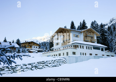 St Anton am Arlberg, Tyrol, Austria, Europe. Ski chalets covered with snow in the Alpine resort in mid winter Stock Photo