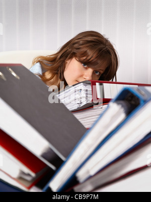 Woman secretary in the office are overworked Stock Photo