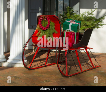 Victorian sleigh filled with Christmas presents Stock Photo