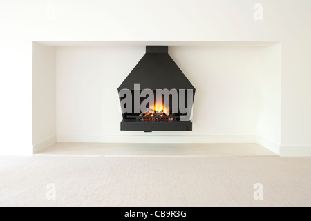 Modern burning gas fire with logs