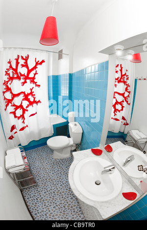 A small separate bathroom in a hotel (France). Petite salle de bain indépendante dans un hôtel (France). Stock Photo