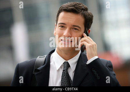 Busy businessman making call in between appointments Stock Photo