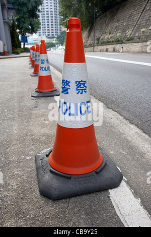 hong kong police traffic cones cordoning off part of a road hksar china Stock Photo